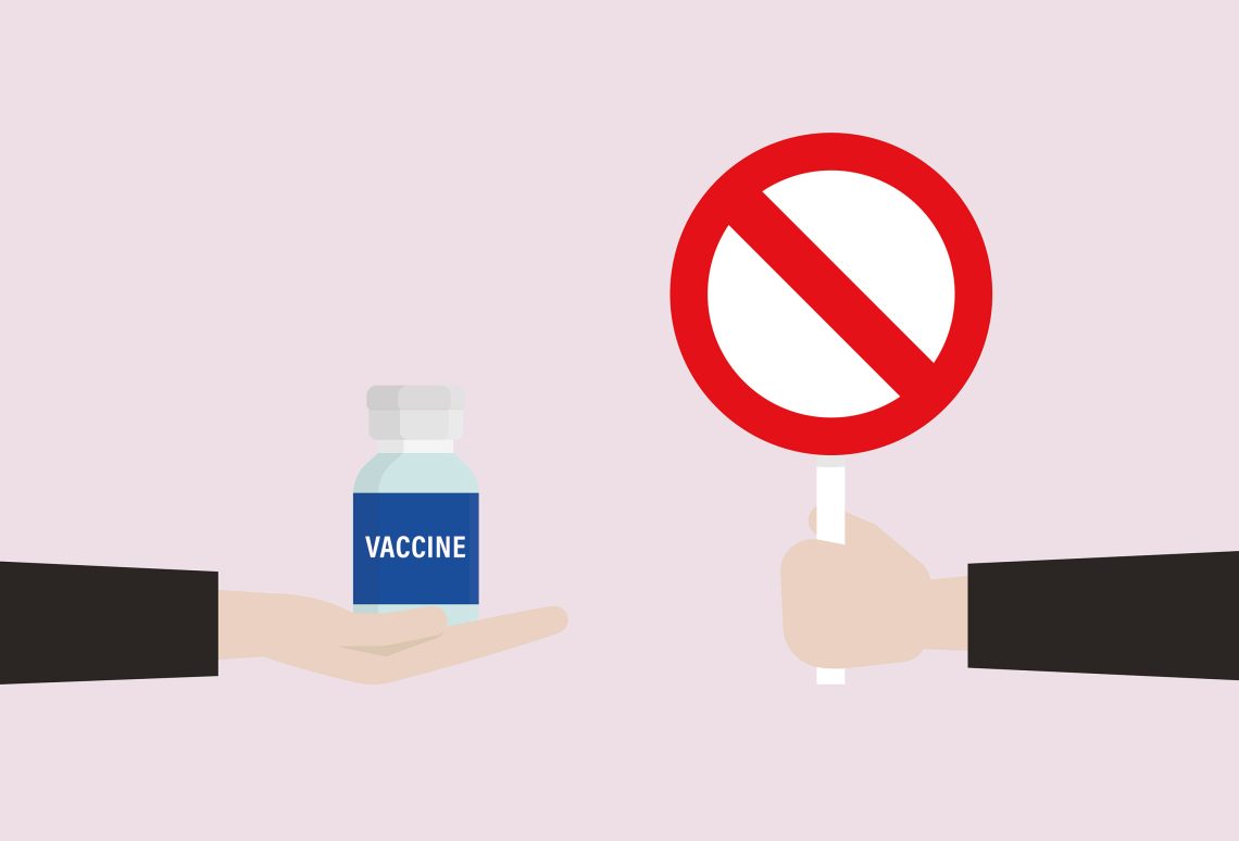 Illustration einer Impfdosis in einer ausgestreckten Hand, der ein Stopschild entgegen gehalten wird